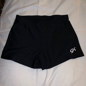 Black cheer shorts.